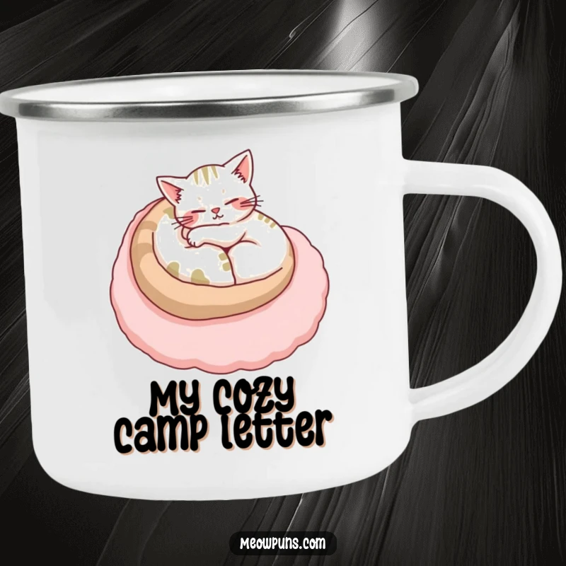 Funny cat camping mug with a content cat curled up on a plush letter, perfect for enjoying drinks during relaxing outdoor trips.