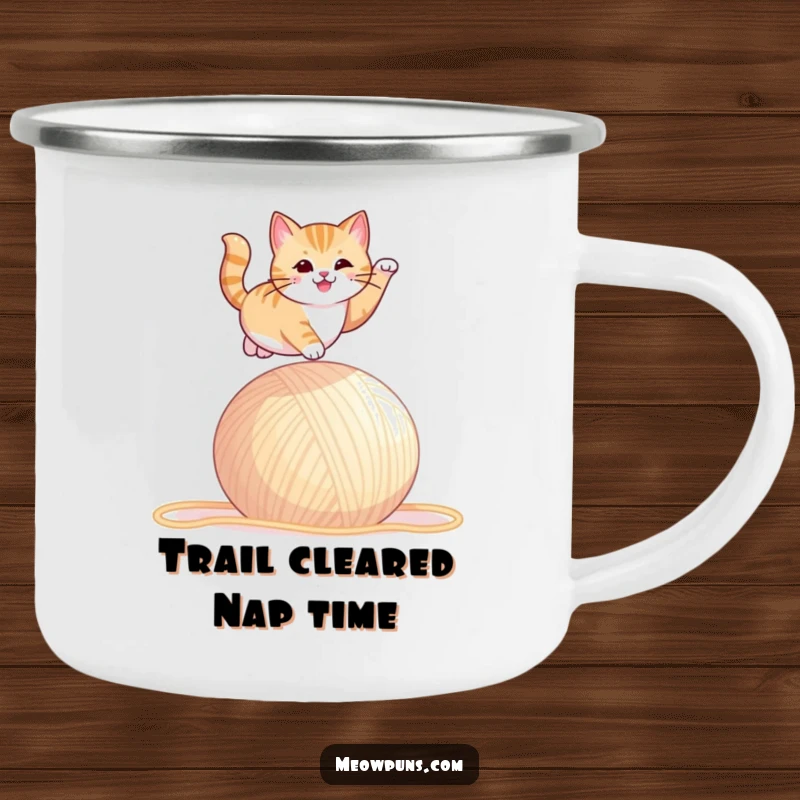 Funny camping mug with a cat leaping over yarn, symbolizing playful adventure and fun outdoors.