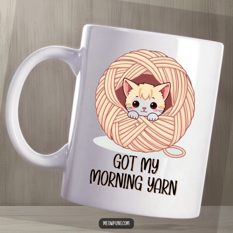 Funny mug with a cute cat character peeking out from a massive, colorful ball of yarn, symbolizing playful mischief.