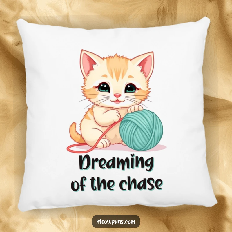 Funny pillow featuring a cute kitten batting at a ball of yarn, perfect for adding a playful and cozy touch.