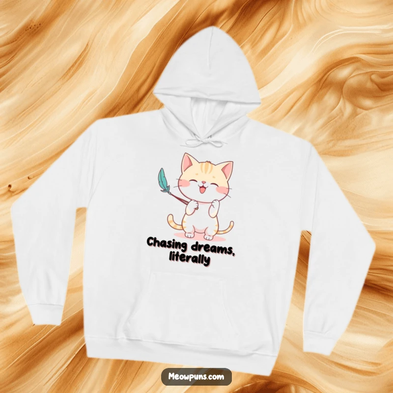 Funny hoodie showcasing a cute cat character enthusiastically playing with a feather wand, radiating pure feline joy and energy.