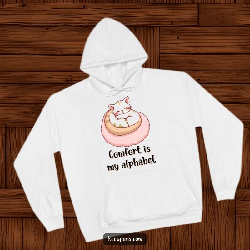 Funny cat hoodie depicting a peaceful cat nestled comfortably on a large, plush letter, exuding warmth and contentment.