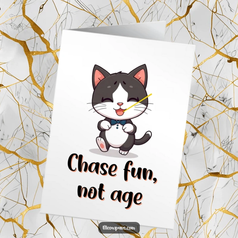 Funny Free Printable Birthday Card: Playful tuxedo cat leaping after a red laser pointer dot.