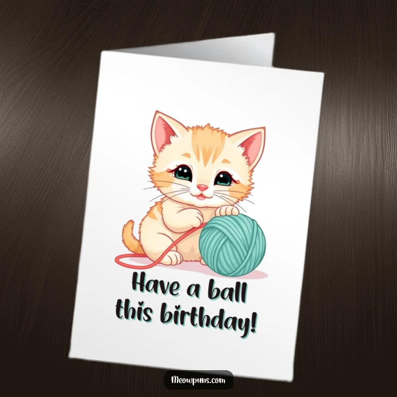 Funny Free Printable birthday card featuring a playful kitten gleefully batting at a ball of yarn, full of birthday cheer.