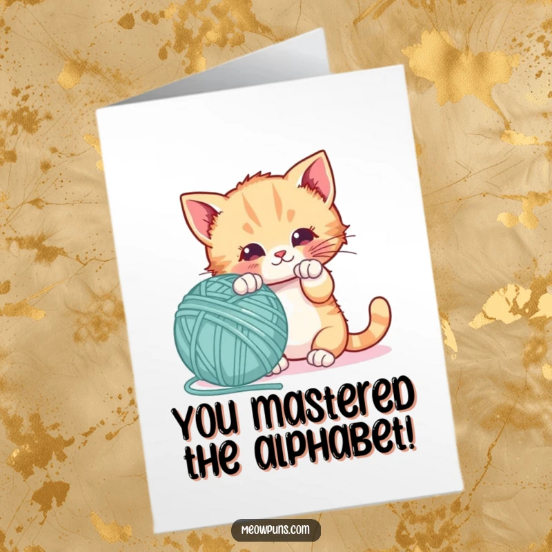 Funny Free Printable Congrats Card: Playful kitten enthusiastically batting at a giant yarn ball letter.