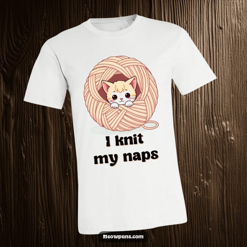 Funny t-shirt with an adorable cat character playfully peeking out from a giant ball of yarn, highlighting cute mischief.
