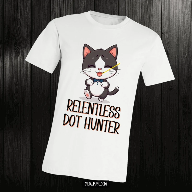 Funny Tuxedo Cat T-Shirt, a playful tuxedo cat intensely chases a red laser pointer dot across a surface.
