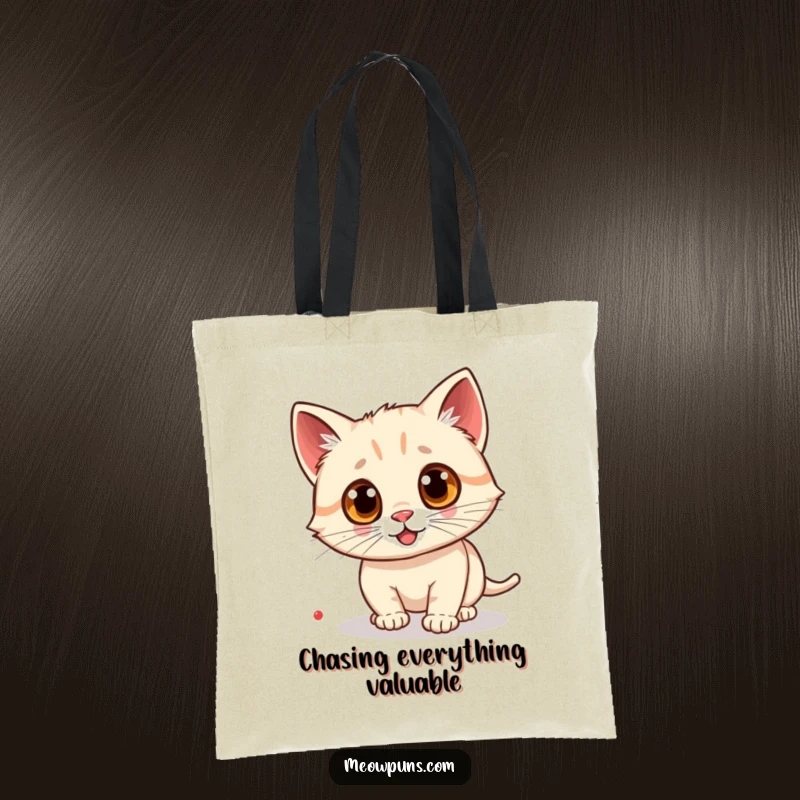 Funny cat tote bag featuring a cat with wild googly eyes fixated on a laser dot, ready for any adventure.